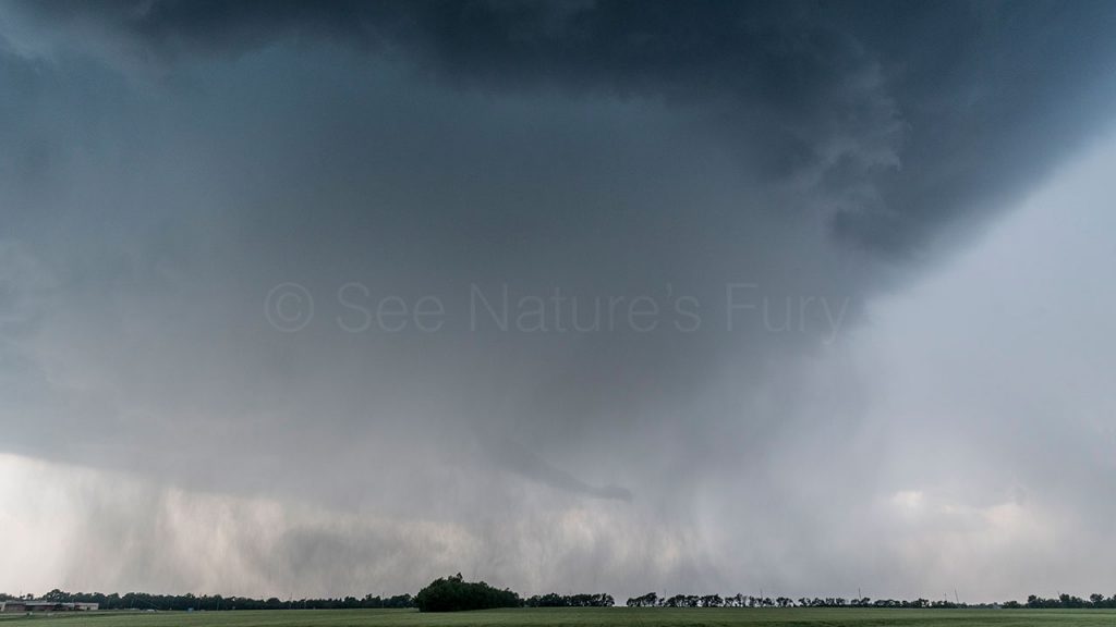 Tornado rope out stage surrounded by hail