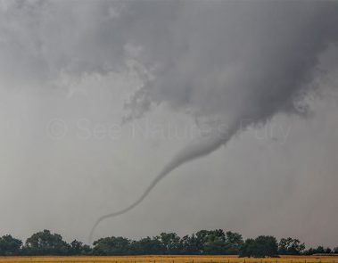 An elephant trunk tornado skips across rural Oklahoma. This was shot during a storm chasing, weather and photography tour.