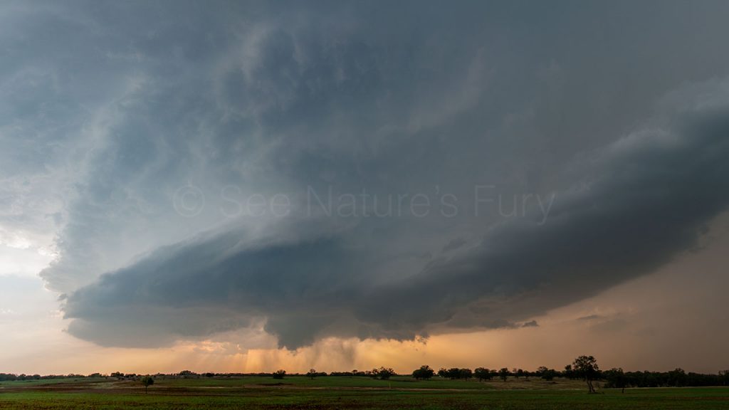 A pretty supercell backlit by the sun in Texas. This was shot during a storm chasing, weather and photography tour.