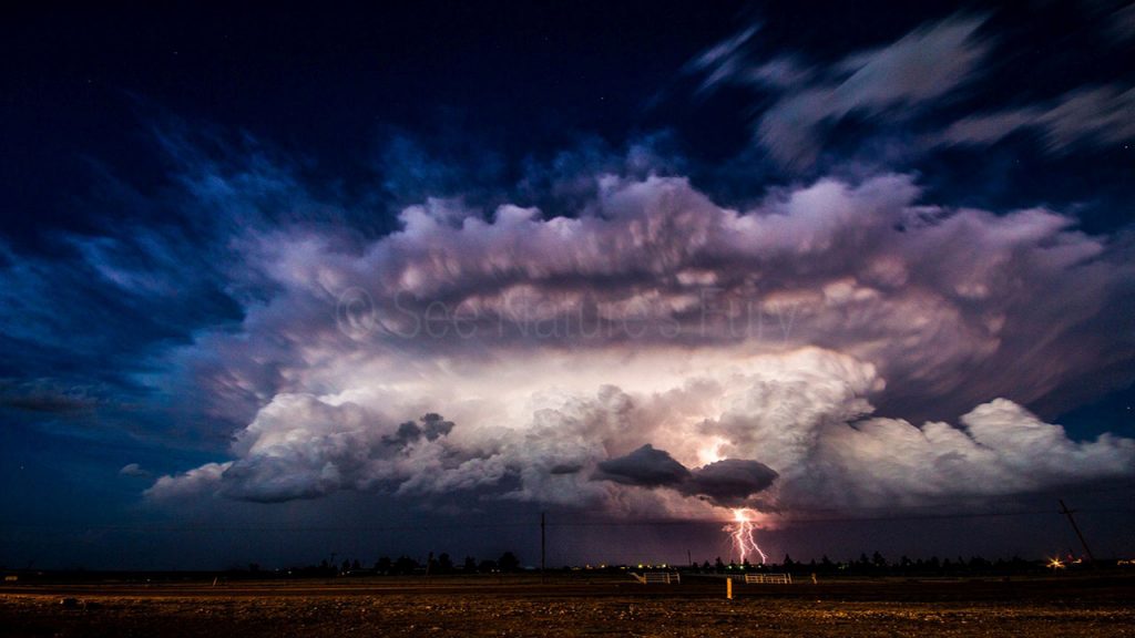 A beautiful supercell thunder storm with lightning over Roswell, New Mexico. Photography taken on a storm chasing tour.