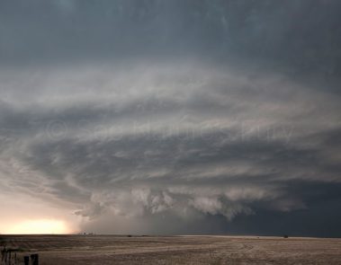 A lone supercell sits stationary over a texan field. This was shot during a storm chasing, weather and photography tour.